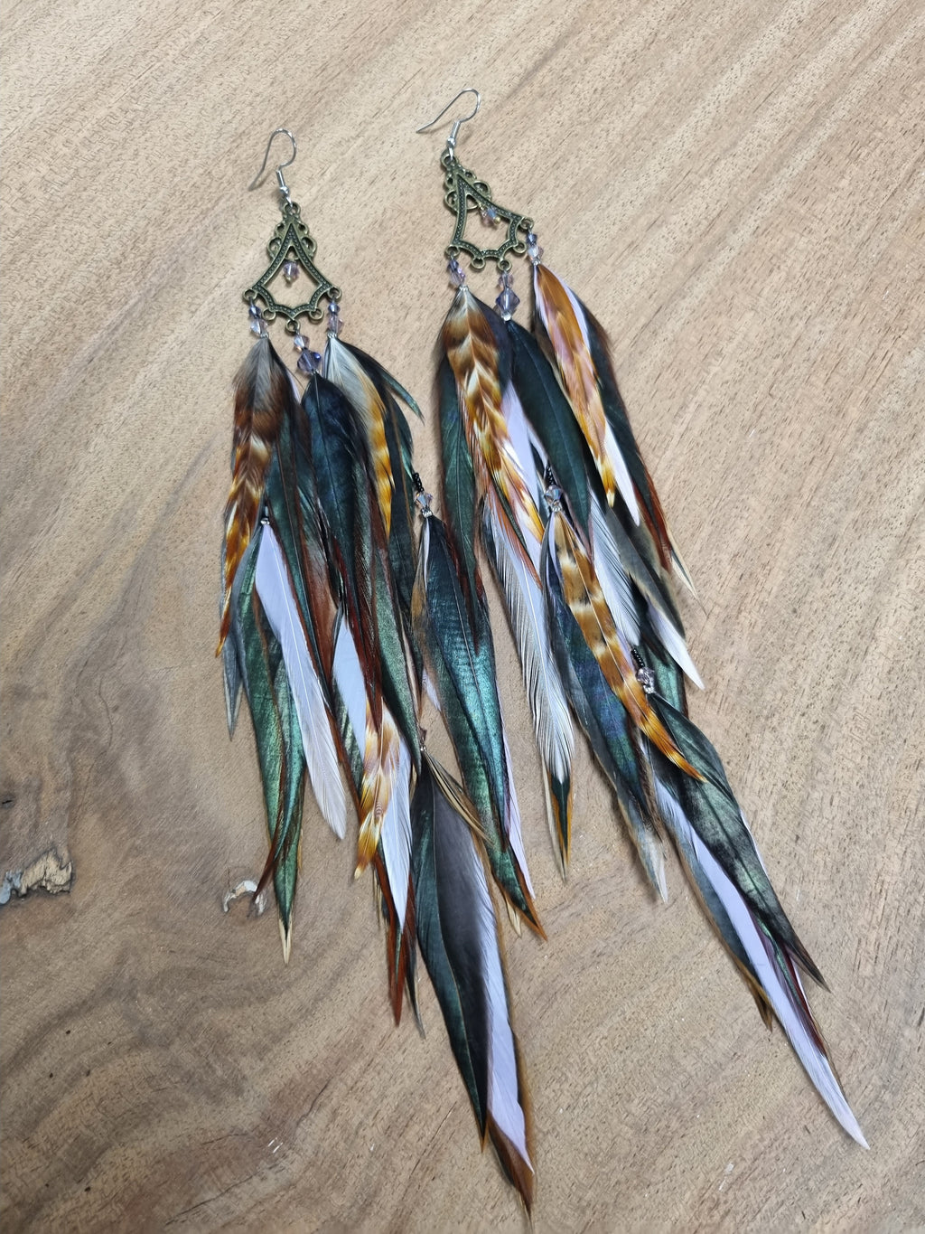 Feather earrings • Dark and lila Feathers with Swarovski
