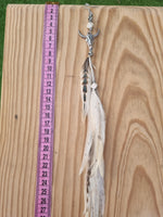 Single Feather earring • Bull Skull Light