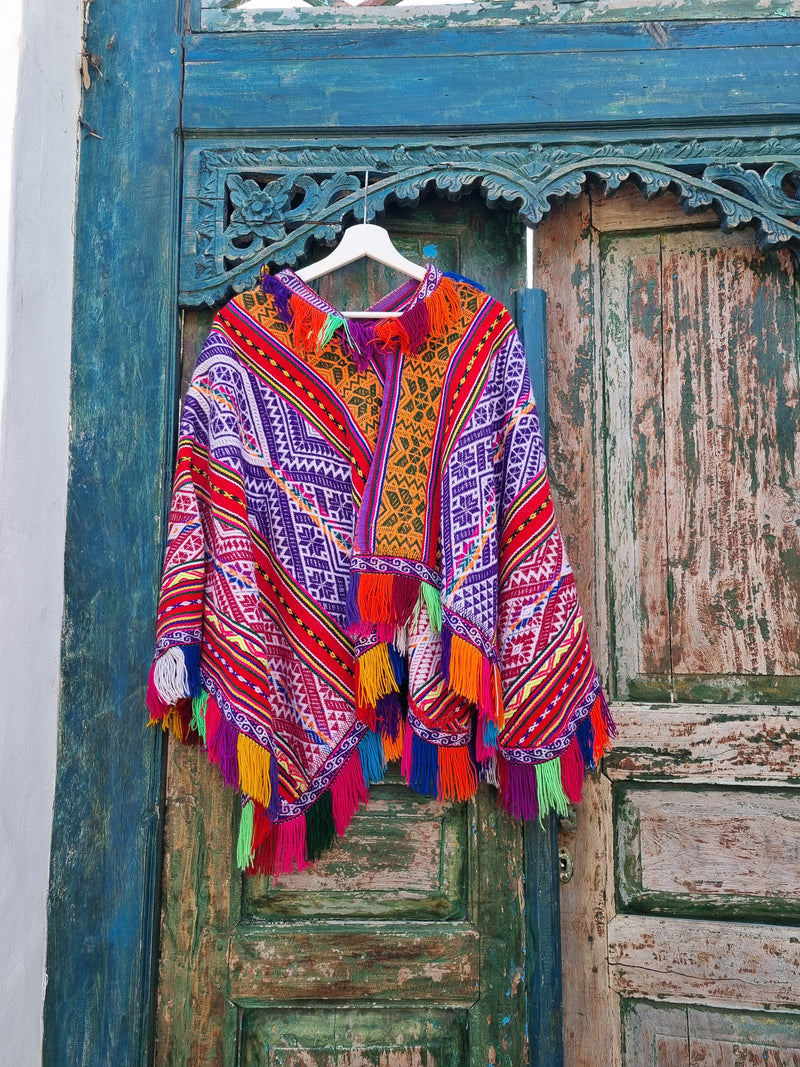 Vintage poncho with fringes